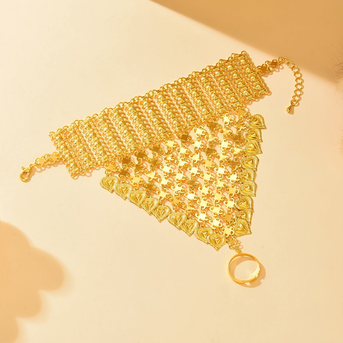 Heart-Shaped Tassel Ethnic Bracelet with Golden Detailing
